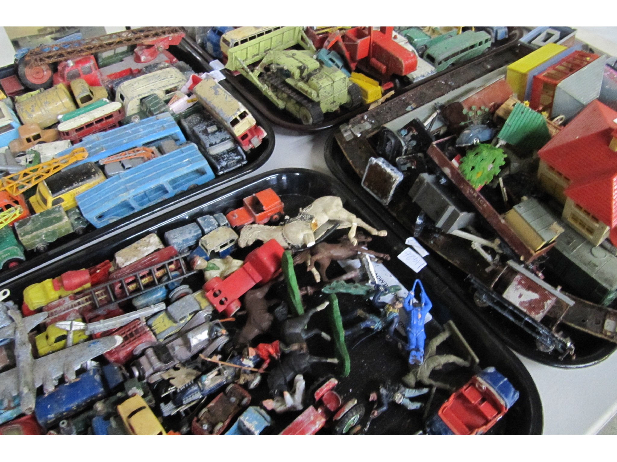 Appraisal: A lot comprising four trays of assorted die-cast models and