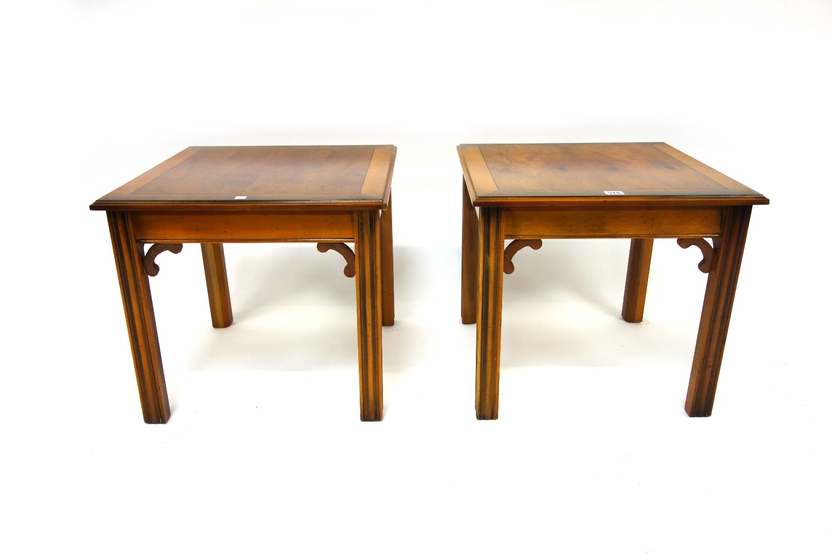 Appraisal: A pair of reproduction yewwood lamp tables in George III