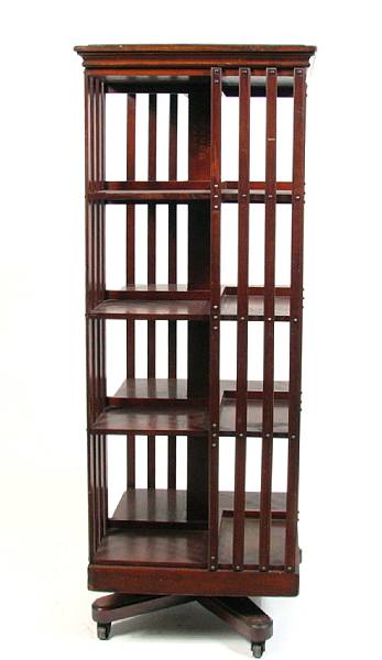 Appraisal: A mahogany revolving bookcase first quarter th century height ft