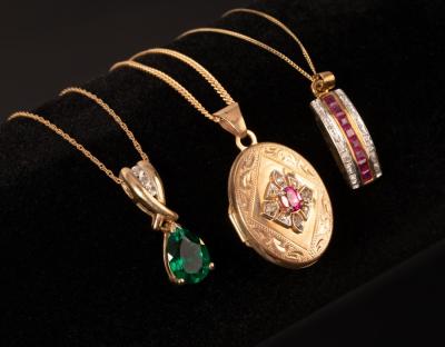 Appraisal: A ruby and diamond set locket in ct yellow gold