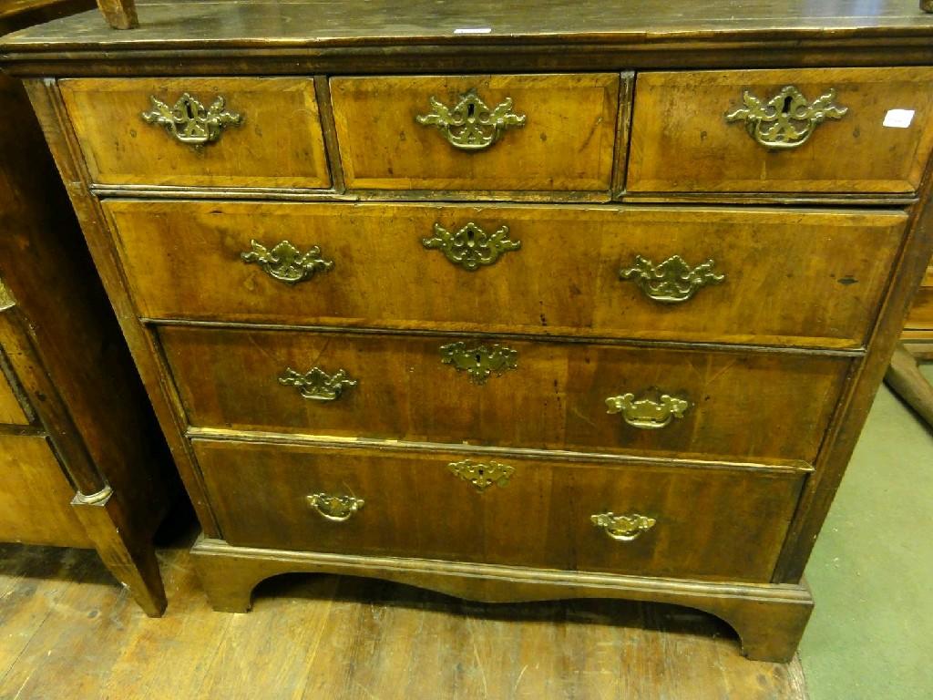 Appraisal: An th century oak chest fitted with an arrangement of