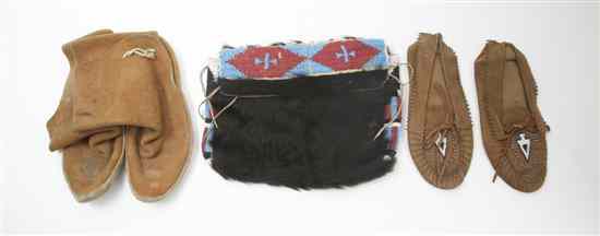 Appraisal: An Arapaho Beaded Bearhide Bag having a flap closure with