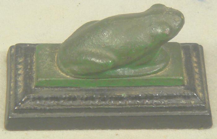 Appraisal: Cast iron doorstop small green frog on black base light