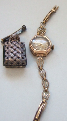 Appraisal: A ladies ct gold cased Everite wristwatch on a gilt