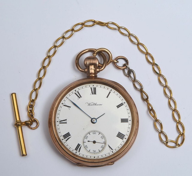 Appraisal: A CT GOLD POCKET WATCH with enamel dial and top