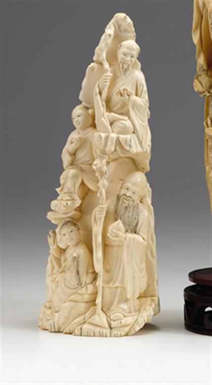 Appraisal: Large Chinese elephant ivory carving Carved in high relief to