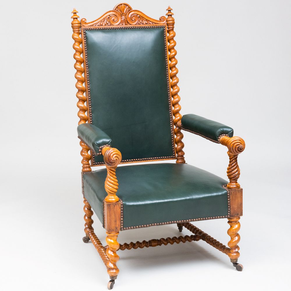 Appraisal: Victorian Carved Oak and Leather Tall Back Armchair Raised on