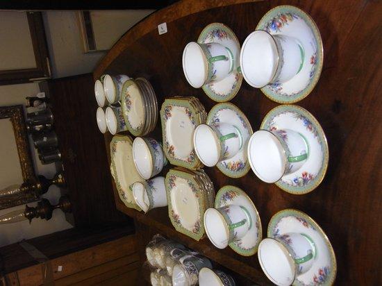 Appraisal: AN AYNSLEY PART TEA SET with green border and painted