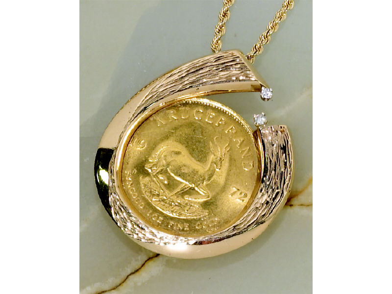 Appraisal: KRUGERRAND PENDANT One oz pure gold Krugerrand dated in yellow