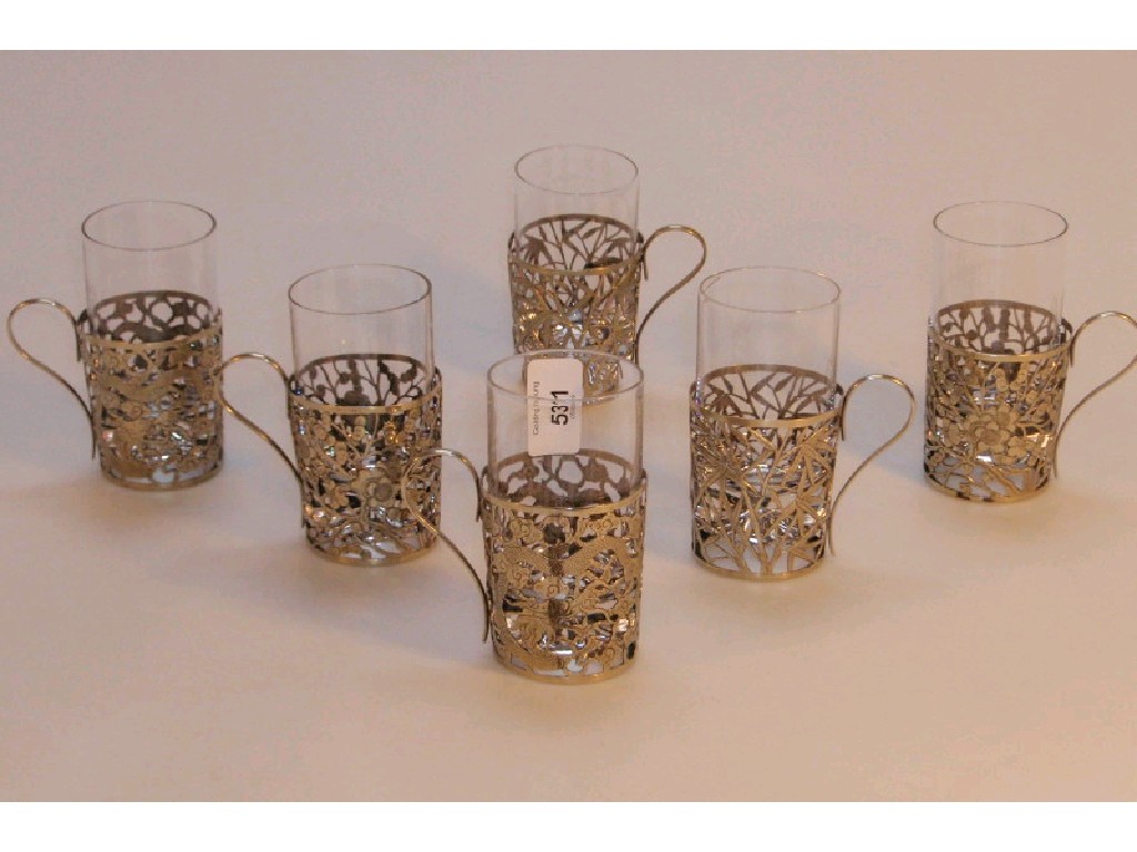 Appraisal: Six Chinese white metal cup sleeves with replacement glass