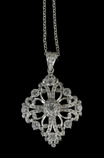 Appraisal: Stunning Eighteen-Karat White Gold and Diamond Snowflake Pendant with platinum