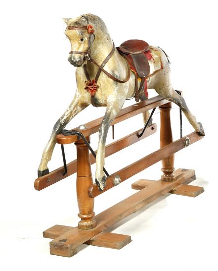 Appraisal: ROCKING HORSE BY TRIANG England ca Carved wooden horse with