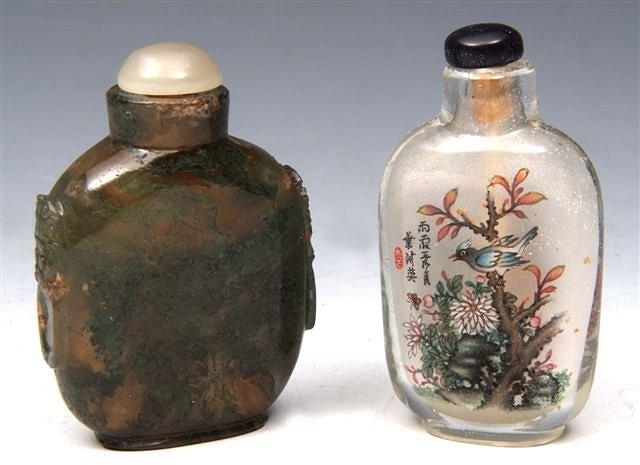 Appraisal: A CHINESE GREEN JADE SNUFF BOTTLE with carved sides high