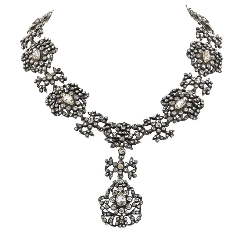 Appraisal: FRENCH SILVER FOIL BACKED PASTE NECKLACE Shield-shaped panels arabesques and