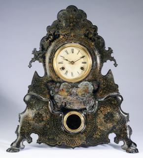 Appraisal: American decorative metal mantel clock th c h American decorative