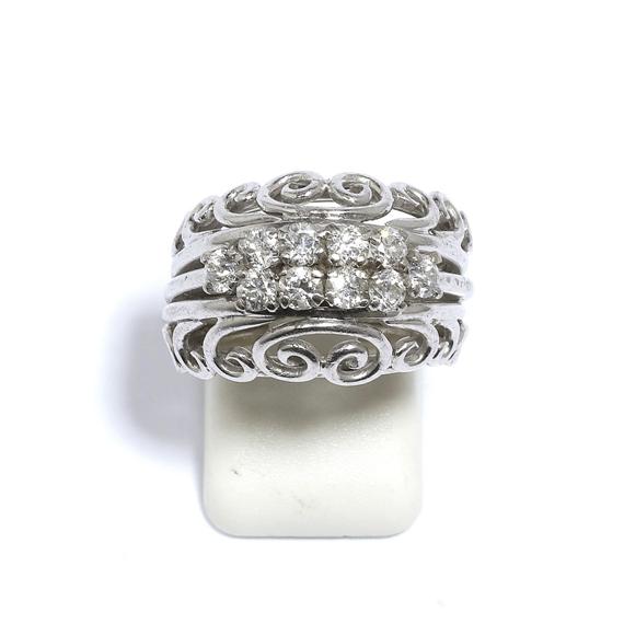 Appraisal: A DIAMOND AND GOLD RING circa White gold Elegant band