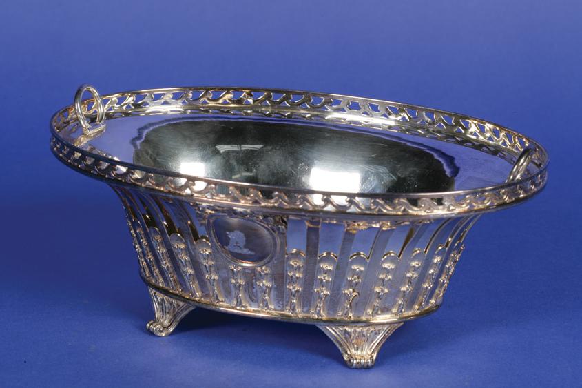 Appraisal: A BASKET of oval form with a pierced wavy frieze