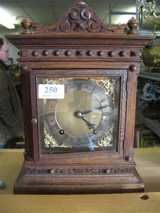 Appraisal: Oak twin train mantel clock