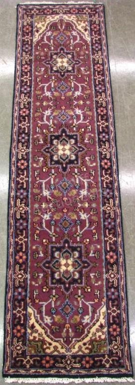 Appraisal: Handmade Oriental Runner Heriz design burgundy field with cream and