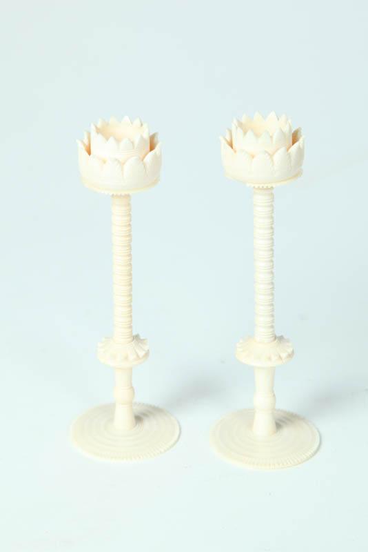 Appraisal: PAIR OF IVORY CANDLESTICKS Asian th century Lotus shaped sockets