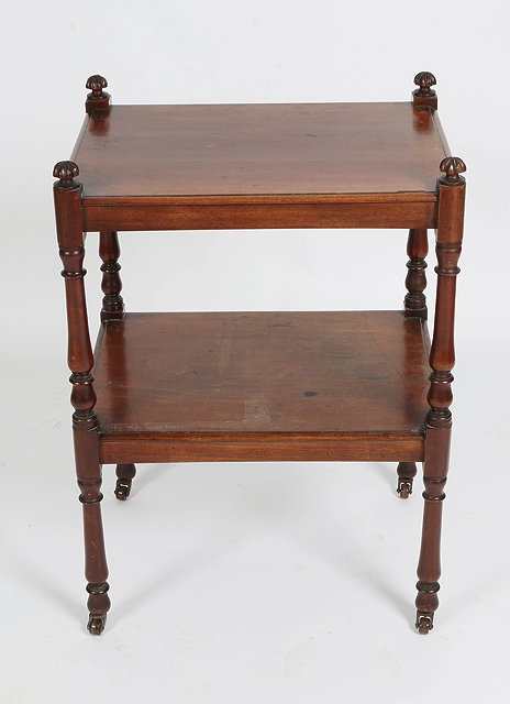 Appraisal: A VICTORIAN MAHOGANY TWO TIER WHATNOT with turned supports and