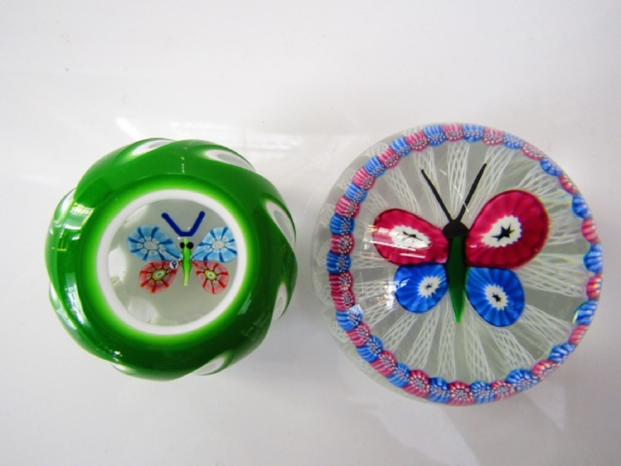 Appraisal: A Millefiori glass paperweight by John Deacons with central butterfly