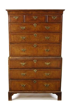 Appraisal: A George II walnut chest on chest cross and feather