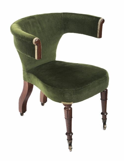 Appraisal: A Regency mahogany and upholstered 'cock fighting' reading chair the