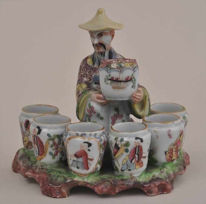 Appraisal: CONTINENTAL PORCELAIN CHINOISERIE FIGURE GROUP Modeled as a seated street