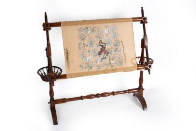 Appraisal: A stained beech tapestry loom with turned upright and spindle