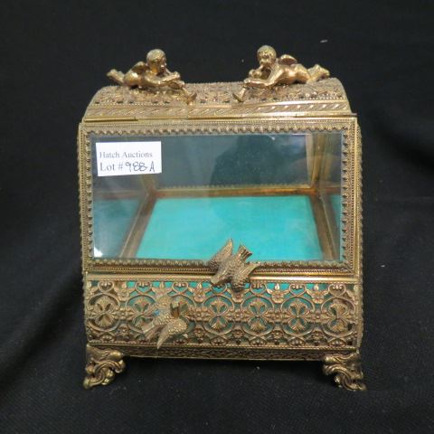 Appraisal: Italian Ornate Brass Dresser Box cherub bird decor beveled glass