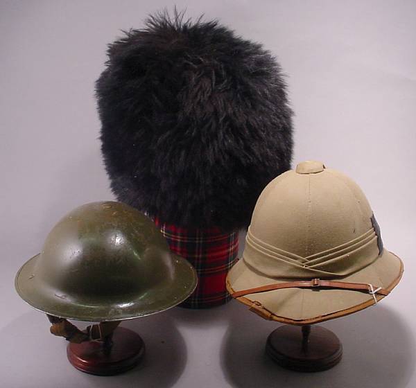 Appraisal: A lot of three items of military headgear Including a