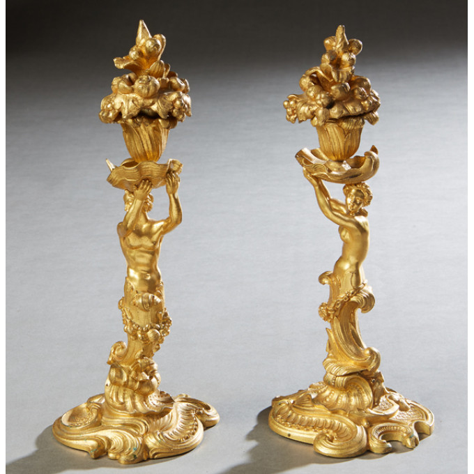 Appraisal: Pair of Continental Gilt Bronze Figural Candlesticks th c the