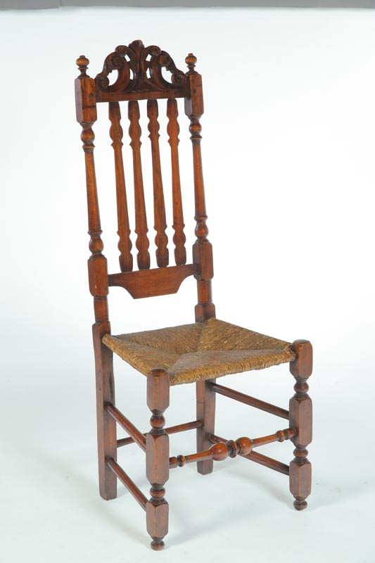 Appraisal: BANISTER BACK SIDE CHAIR American th century hardwood Well-carved scrolled