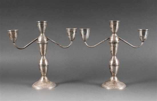 Appraisal: Pair of American weighted sterling silver three-light candelabra Duchin third