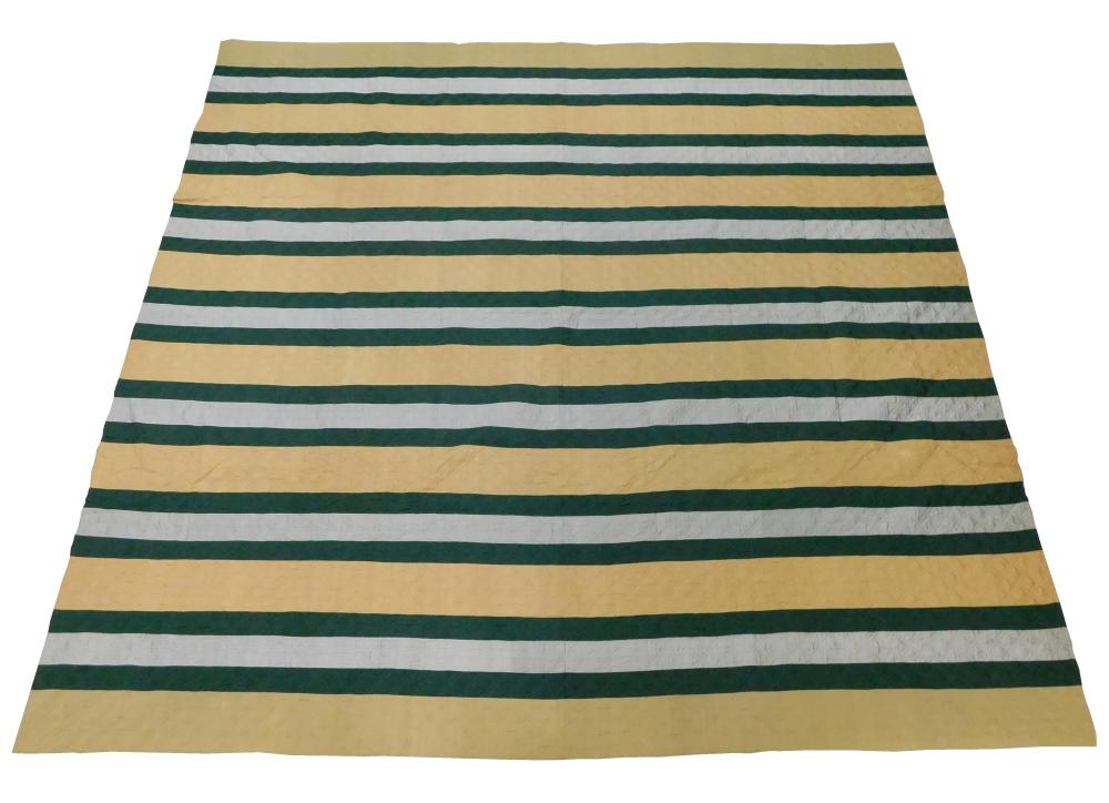 Appraisal: TEXTILE Pieced quilt in stripes of tan dark green and