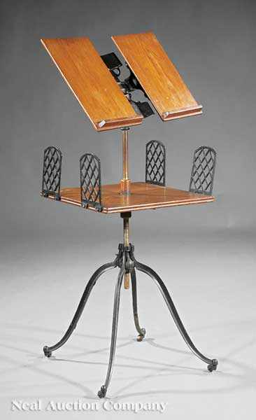 Appraisal: An Antique American Cast Iron and Oak Dictionary Stand patent