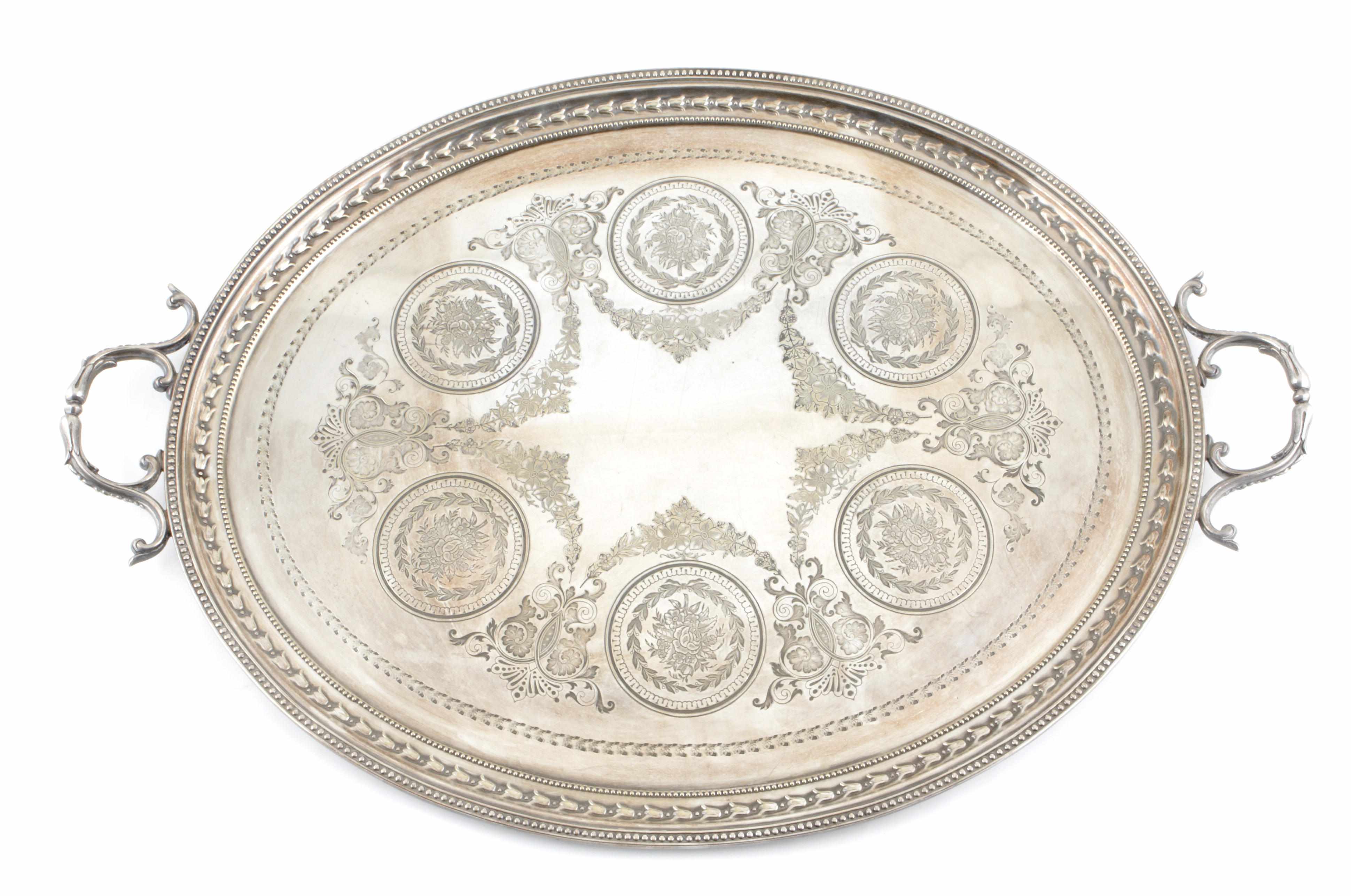 Appraisal: A Victorian electroplated oval tea tray with stamped decoration Unmarked