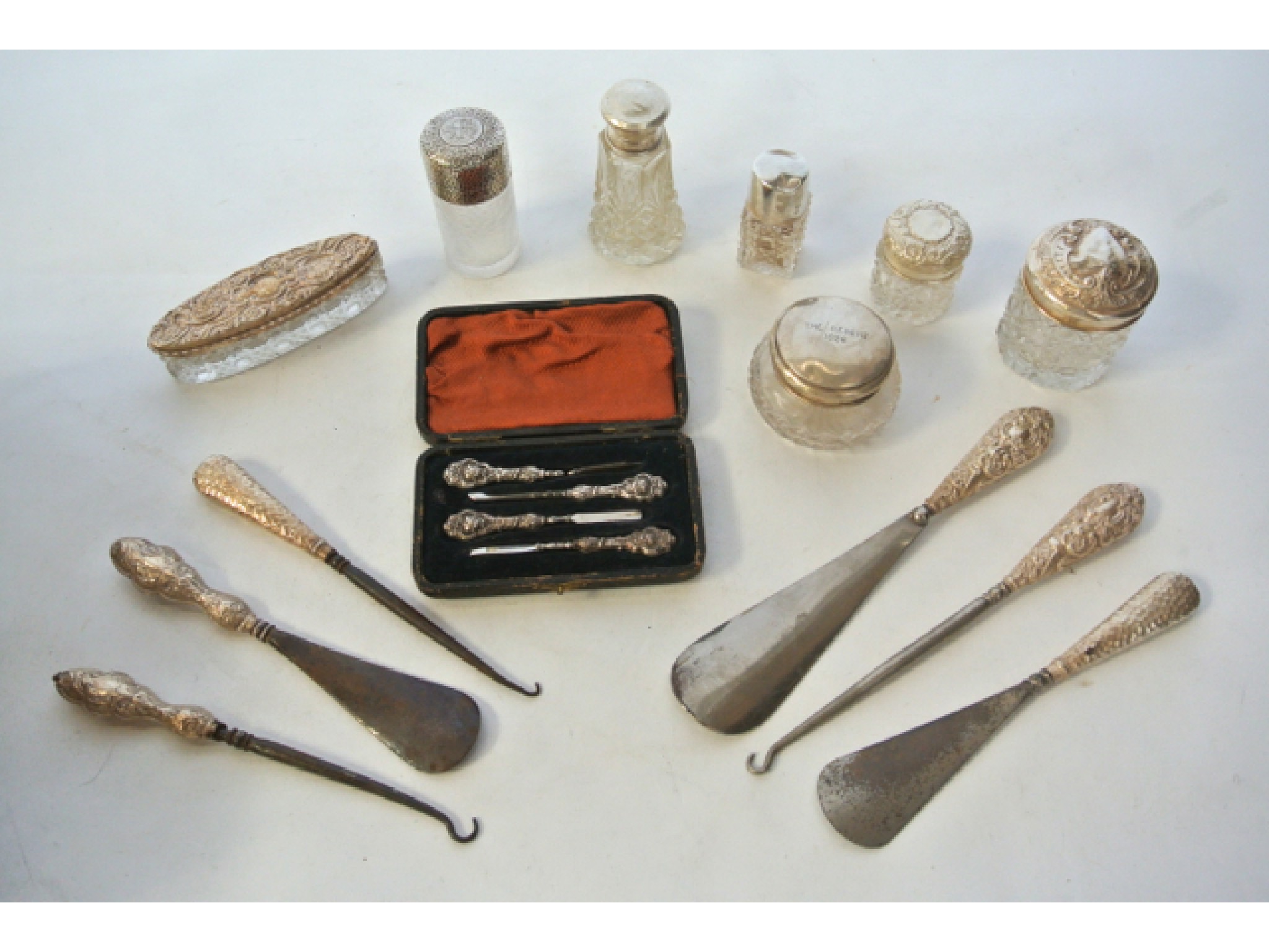 Appraisal: A miscellaneous collection of silver-mounted dressing table items various makers