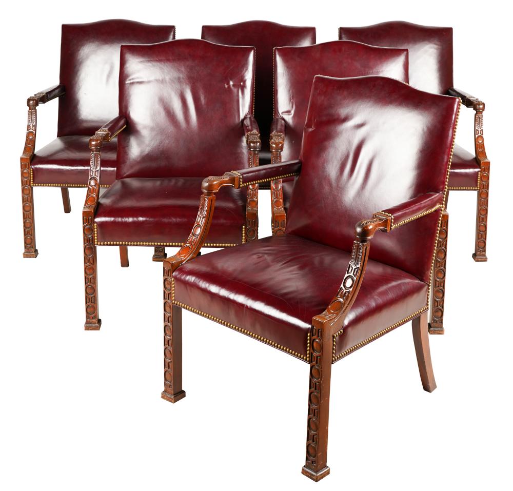 Appraisal: ELEVEN CHIPPENDALE-STYLE BURGUNDY LEATHER ARMCHAIRS th century unsigned with carved