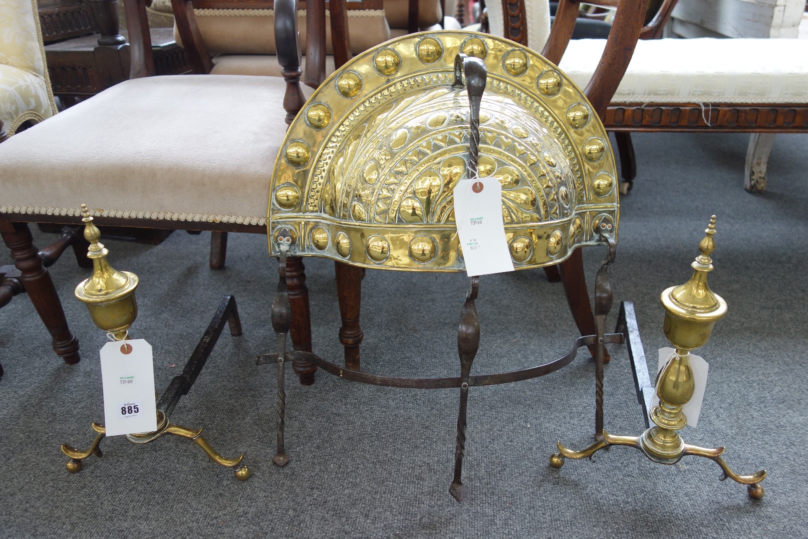 Appraisal: A pair of American brass and wrought iron andirons circa