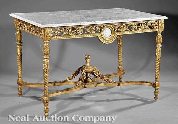 Appraisal: A Louis XVI-Style Carved and Gilded Salon Table white marble