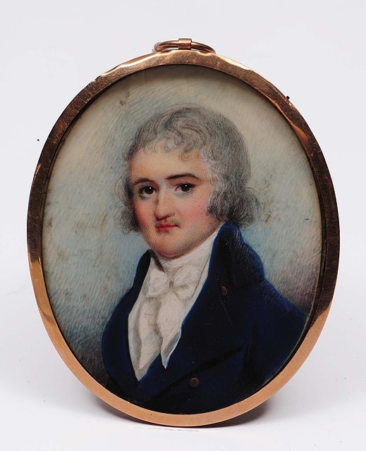 Appraisal: An oval miniature portraitlate th Centurygentleman wearing a blue jacket