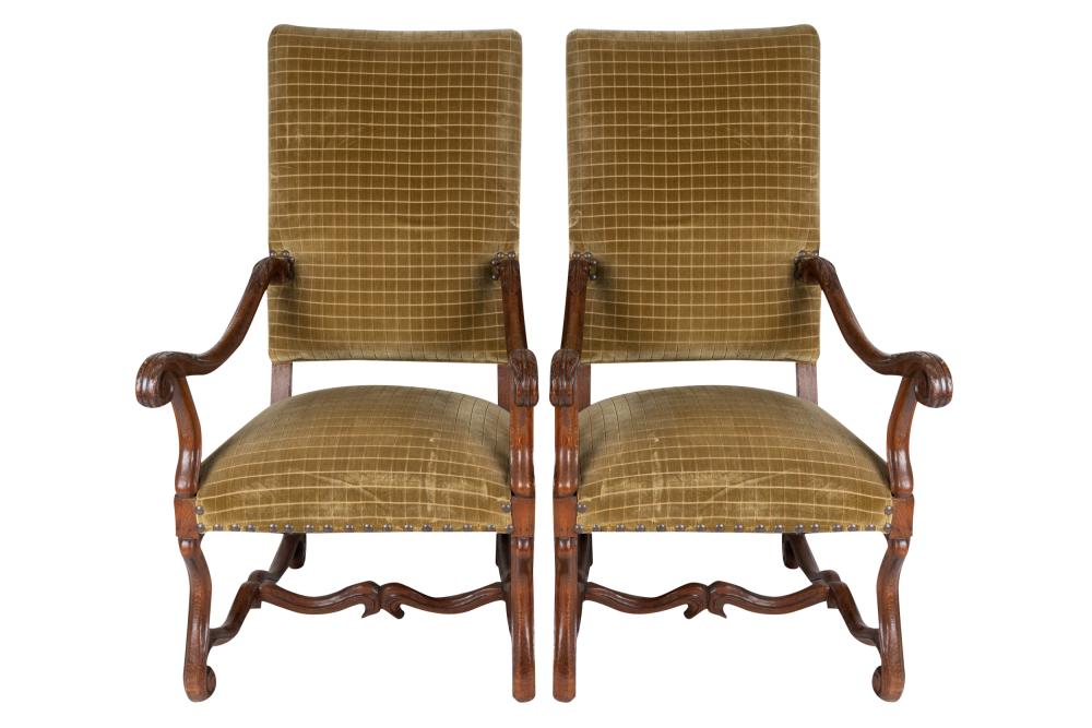 Appraisal: PAIR OF LOUIS XIV STYLE CARVED OAK FAUTEUILScovered with olive-green