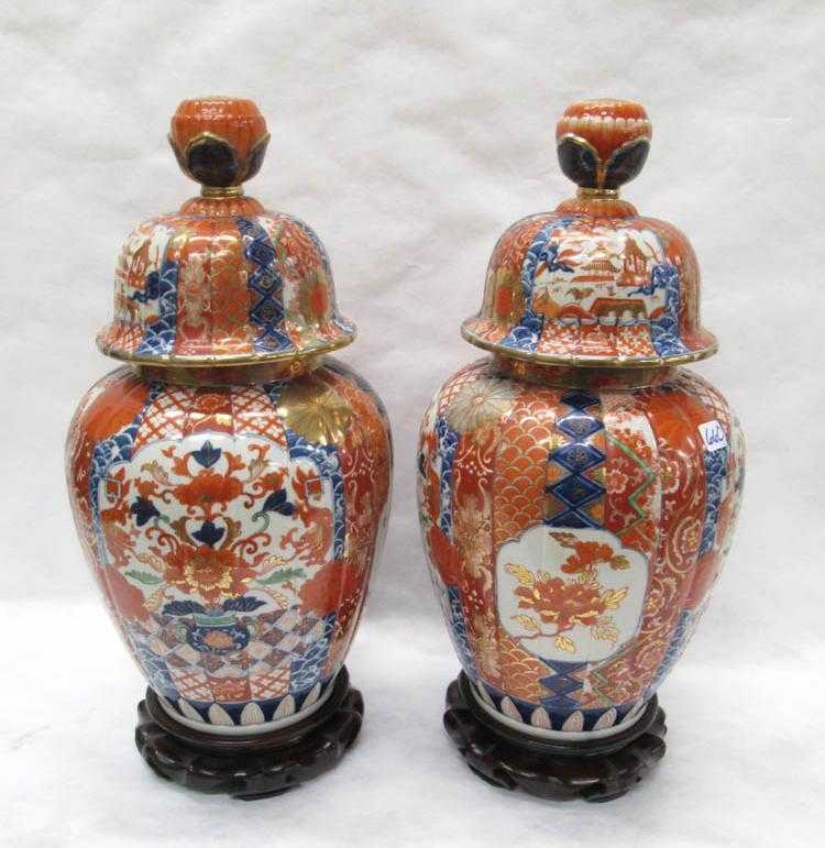 Appraisal: PAIR OF JAPANESE IMARI LIDDED JARS of baluster form with