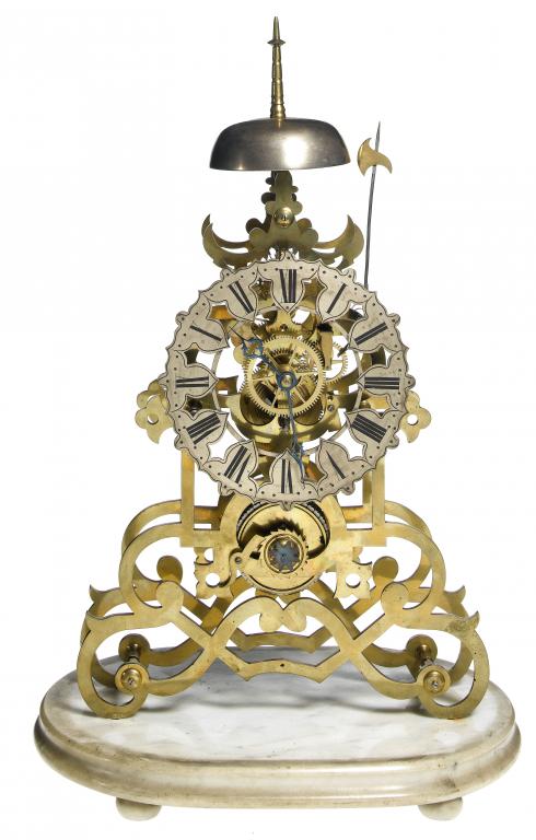 Appraisal: A VICTORIAN BRASS SKELETON CLOCK with silvered chapter ring of