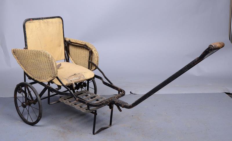 Appraisal: Early Wicker And Metal Baby Carriage Pull carriage with wicker