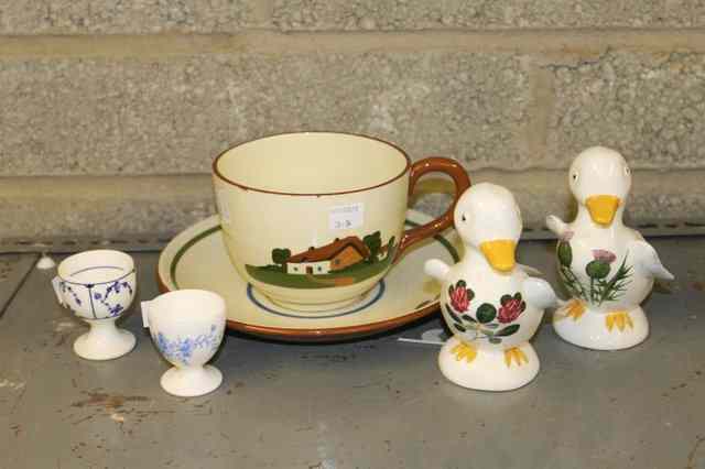 Appraisal: A PAIR OF PLICHTA POTTERY MODEL DUCKLINGS a Grainger Co