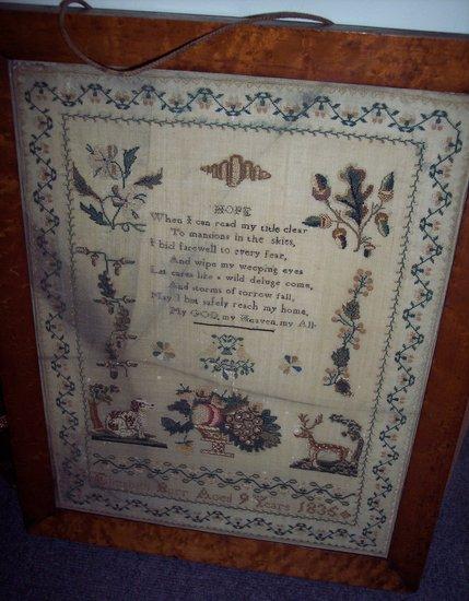 Appraisal: A needlework sampler by Elizabeth Burr aged embroidered a poem