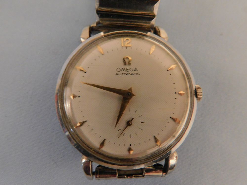 Appraisal: OMEGA STAINLESS AUTOMATIC WATCH Vintage Omega men's stainless steel automatic